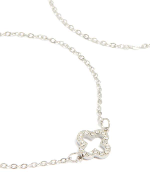 Featuring waterproof stainless steel cubic zirconia solitaire flower charm bracelets in a 2-pack with coin detail, crafted from crystal in silver and white close up view
