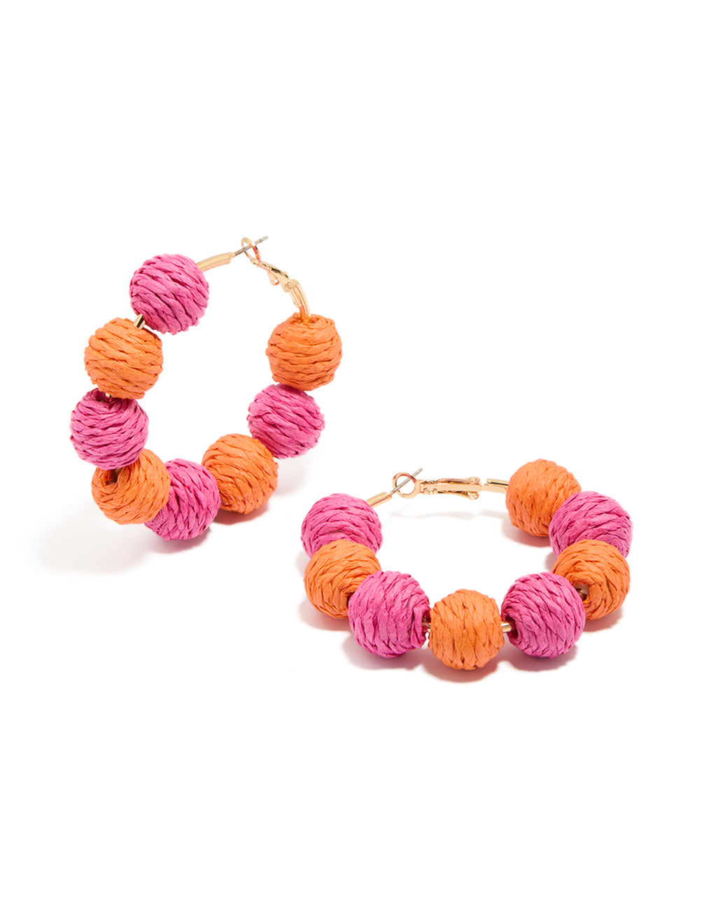 Beautifully crafted statement hoop earrings featuring alternating light pink and coral paper-wrapped balls front view
