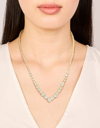 Crafted from gold plated cubic zirconia, this gradient bezel necklace and statement style on neck view - link has visual effect only