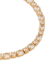 Highlighting a gold plated large square cut cubic zirconia tennis bracelet close up view - link has visual effect only
