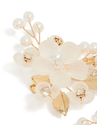 This gold plated pearl and acrylic flower clip showcases leaf accents with floral details in ivory and white side view - link has visual effect only