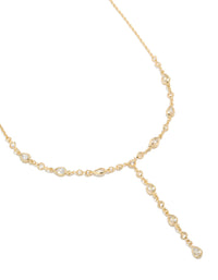 Showcasing a gold plated cubic zirconia alternating Y-necklace in statement style close up view - link has visual effect only