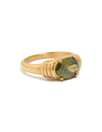 Showcasing a waterproof ring with oval cut green cubic zirconia in dainty gold plated stainless steel and crystal accents side detail view - link has visual effect only