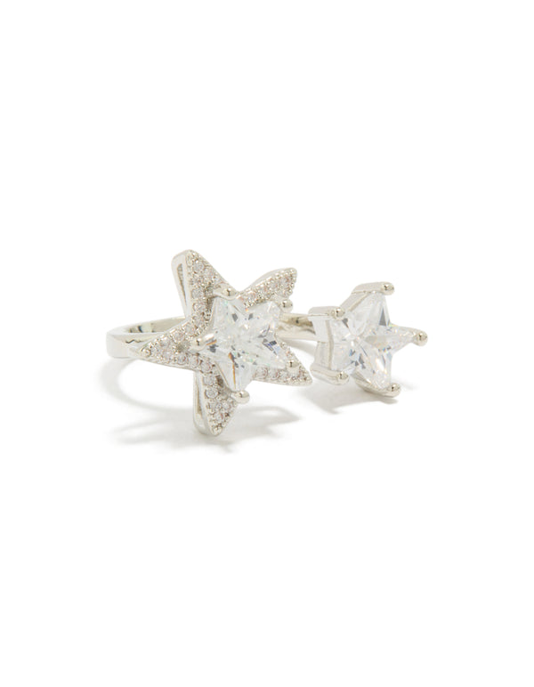 Showcasing a silver cubic zirconia statement ring featuring celestial star motifs front view