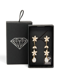 Elegant gold cubic zirconia double floral drop earrings featuring statement style close up view - link has visual effect only