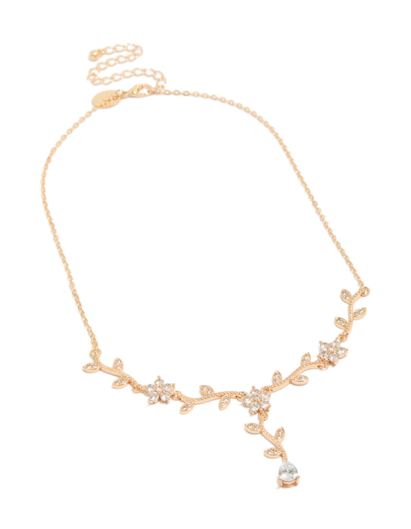 Elegant statement necklace with floral vine design featuring leaf accents and cubic zirconia in gold front view
