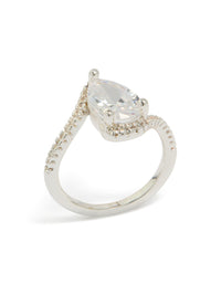 Featuring a silver plated pear cubic zirconia engagement ring with crystal embellishments and statement styling in clear front view - link has visual effect only