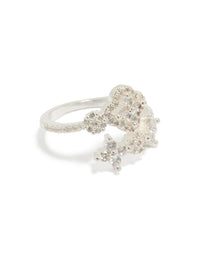 Showcasing a silver plated dainty cubic zirconia floral wrap ring in clear front view - link has visual effect only