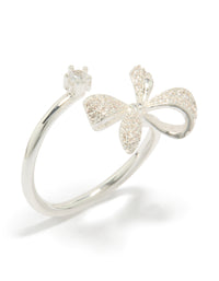 Showcasing a bow crafted from silver plated material with clear cubic zirconia in dainty style wrap ring side detail view - link has visual effect only