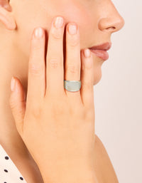 Crafted from waterproof stainless steel, this square signet ring with shell in silver and clear on finger view - link has visual effect only