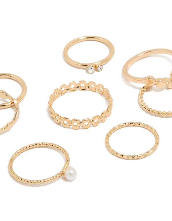 Featuring gold pearl and thin mixed stacking rings in a statement 3-pack details close up view