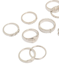 Crafted from silver, this signet and ribbed rings 10-pack with celestial star accents in dainty statement design close up view - link has visual effect only