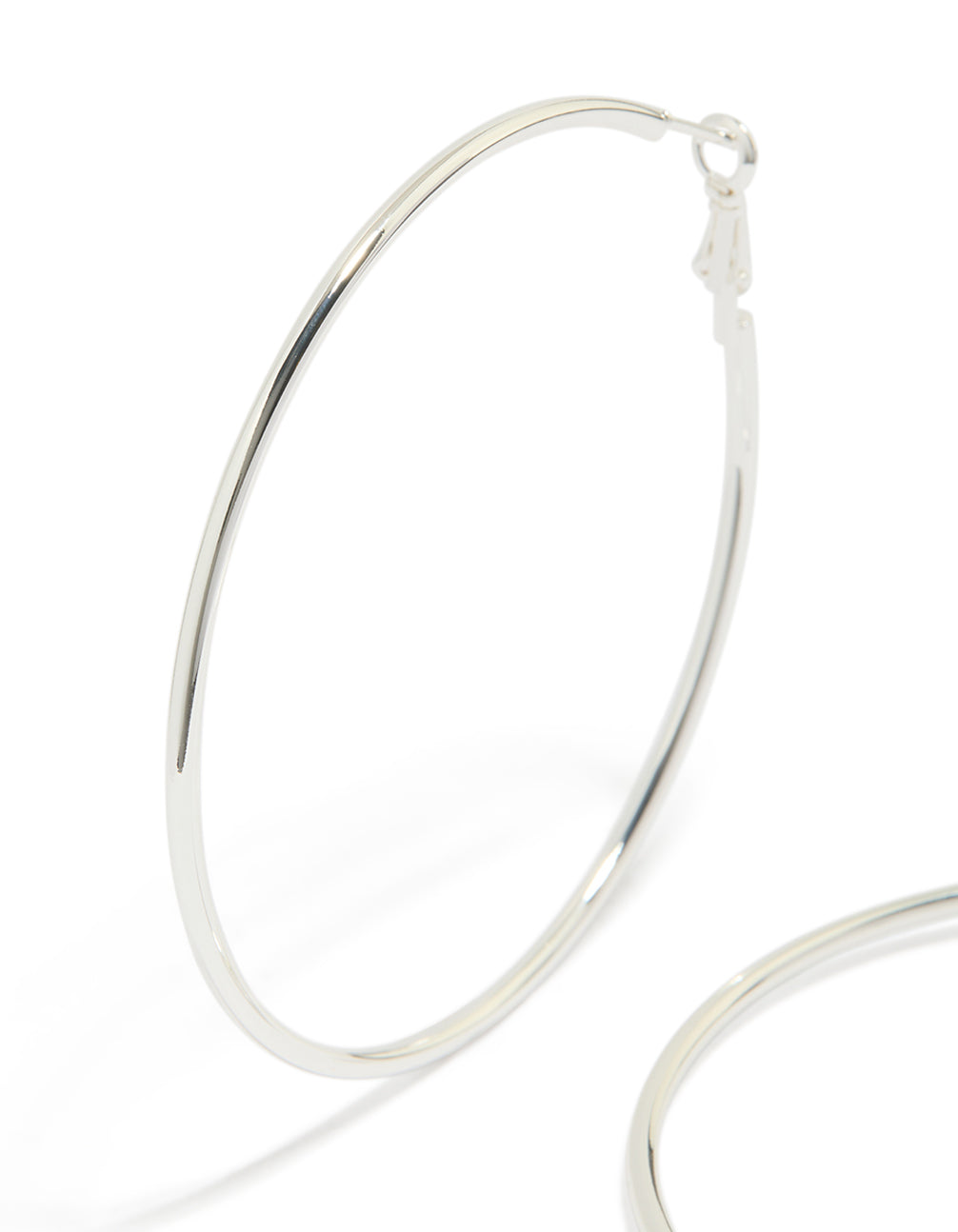 Featuring waterproof stainless steel thin hoop earrings in statement style with silver finish and 65 MM closure close up view