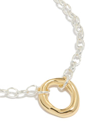 Showcasing a waterproof mixed metal plated stainless steel organic round necklace crafted from gold and silver close up view - link has visual effect only