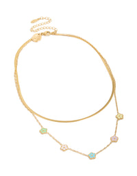 Featuring a waterproof snake chain layered necklace with floral charm in gold plated stainless steel front view - link has visual effect only