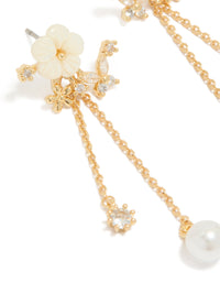 Exquisitely designed gold plated cubic zirconia flower pearl drop earrings with charm close up view - link has visual effect only