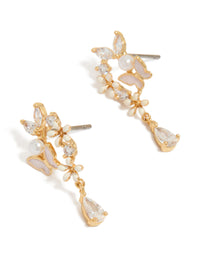 These are gold plated cubic zirconia and pink enamel butterfly cluster drop earrings featuring with pearl accents and pear stone cut front view - link has visual effect only