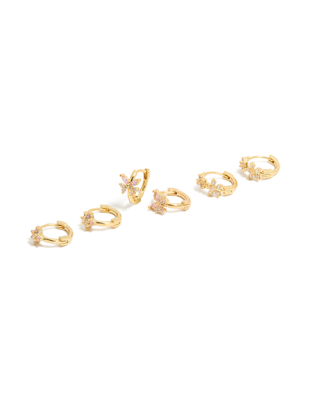 Showcasing floral cubic zirconia gold plated huggie earrings in a 3-pack with clear and hot pink accents front view