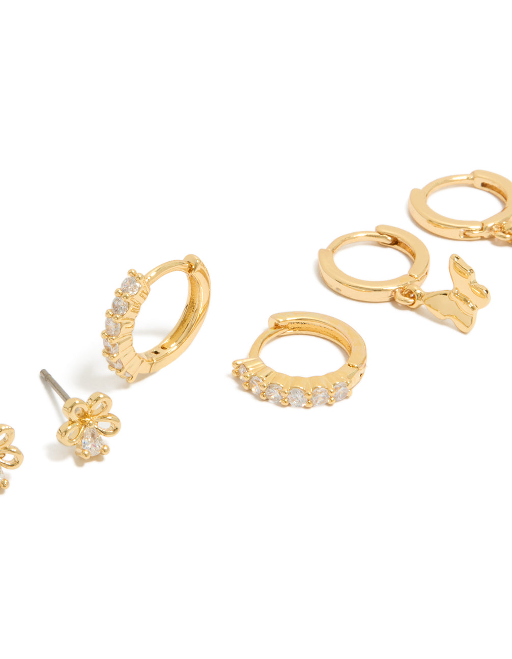 Explore dainty gold plated cubic zirconia bow and butterfly huggie earrings in a 3-pack close up view