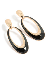 Striking statement drop earrings featuring hollow oval design with black enamel detailing in gold front view - link has visual effect only