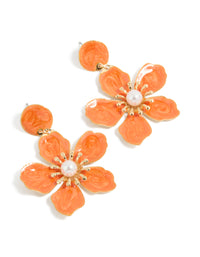 Showcasing statement drop earrings featuring big orange floral design with pearl center accents in gold front view - link has visual effect only