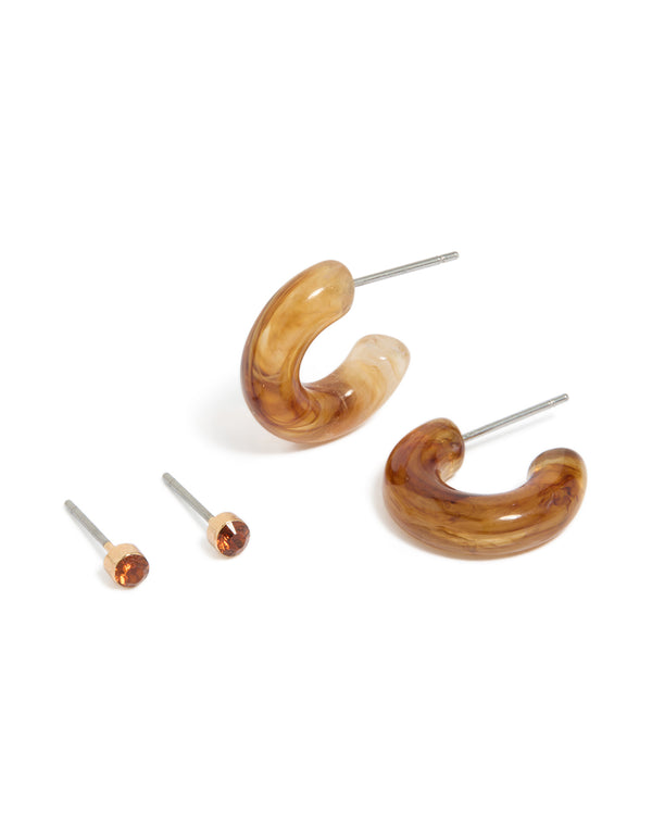 Featuring gold tortoiseshell acrylic hoop and stud earrings in a 2-pack front view