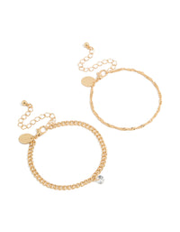 Showcasing gold diamante drop and chain bracelets in a 2-pack with featuring solitaire stone cut front view - link has visual effect only