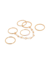 Showcasing a gold pearl chain and thin rings 6-pack with beaded charm accents front view - link has visual effect only