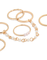 Showcasing gold pearl chain and thin rings 6-pack close up view - link has visual effect only