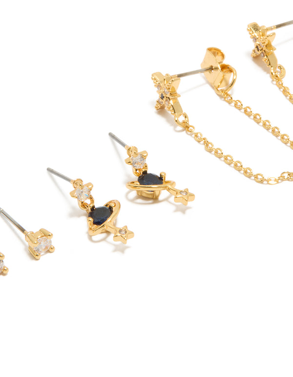 Showcasing statement celestial chain & stud earrings with gold plated cubic zirconia star motifs in a 3-pack close up view
