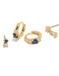 Featuring gold plated mixed cut blue cubic zirconia mini earrings in a 3-pack with crystal huggie closure close up view - link has visual effect only