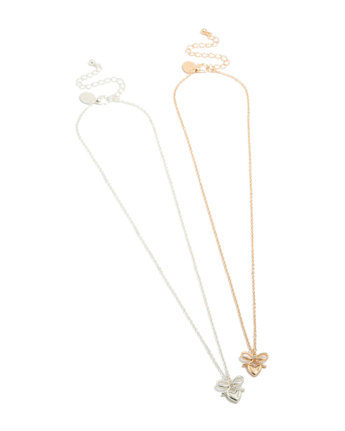 Featuring mixed metal bow and heart pendant necklaces in gold and silver 2-pack front view