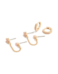Presenting a gold pink cubic zirconia chain flower and huggie earrings pack with floral featuring crystal embellishments and stud huggie closures front view - link has visual effect only