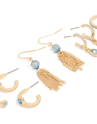 Featuring gold blue cubic zirconia studs and tassel hoop earrings 5-pack with beads, charm details in crystal close up view - link has visual effect only