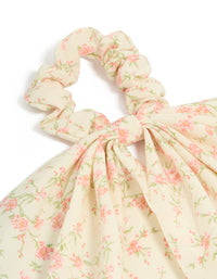 Crafted with pretty pink flower printed scarf scrunchie with leaf and floral pattern in cornsilk, light pink, and pale green side view - link has visual effect only