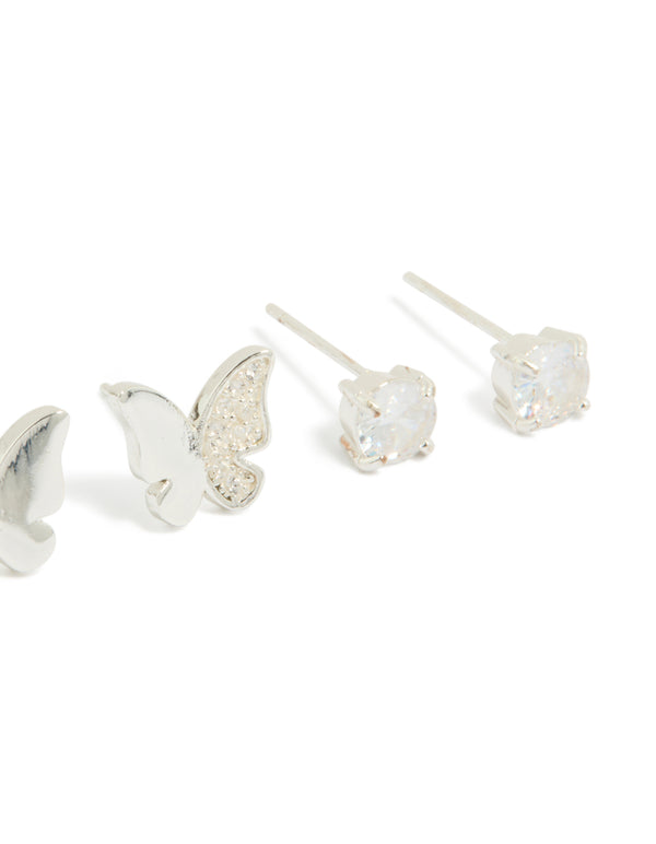 Showcasing stainless steel butterfly stud earrings, detailing cubic zirconia embellishments, waterproof 2-pack in silver and clear close up view