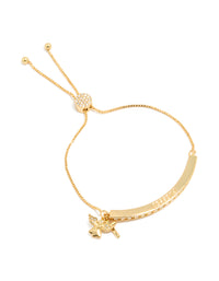 Featuring an angel charm with wings, this gold plated cubic zirconia toggle bangle showcases crystal and a statement design in front view - link has visual effect only