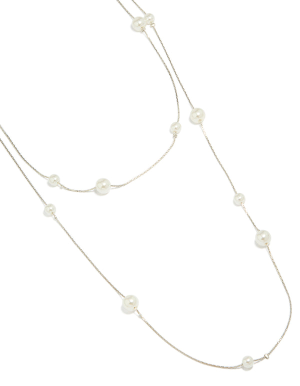 Discover this silver pearl layered necklace in ivory close up view