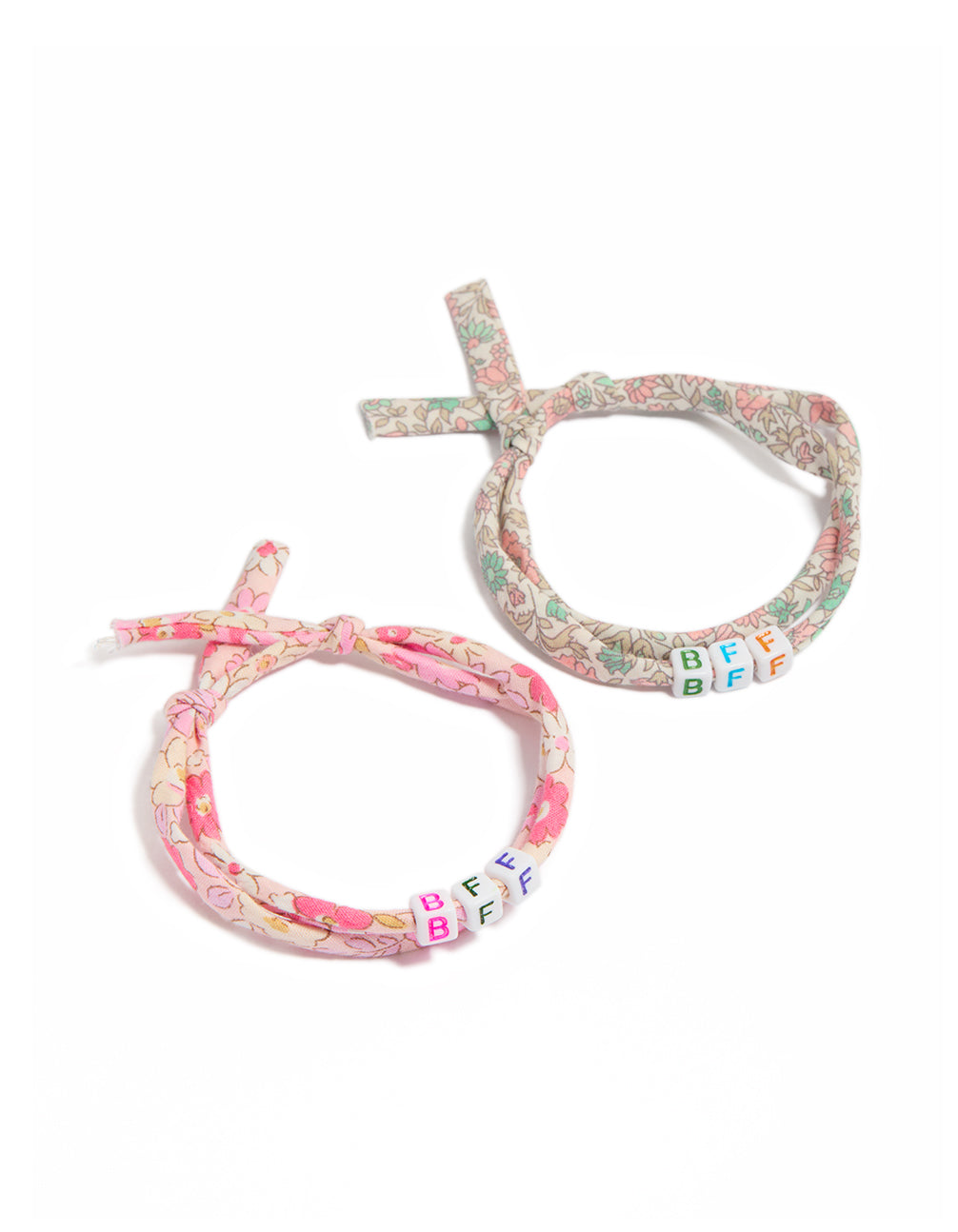 Showcasing beaded floral script 2-pack fabric bracelets in pink, beige, light green, and white front view