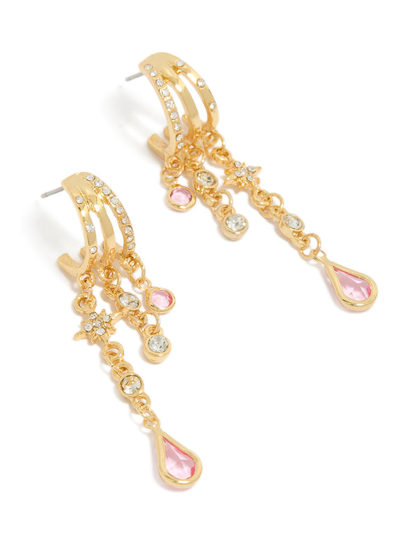 Showcasing statement hoop earrings with star celestial charms crafted from gold plated cubic zirconia in light pink and clear front view