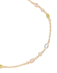 Showcasing a gold plated pink blue and green cubic zirconia ovals necklace with oval stone cut in statement style close up view - link has visual effect only