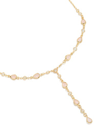 Showcasing a gold plated pink oval cubic zirconia Y-necklace close up view - link has visual effect only