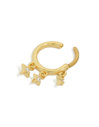Presenting a gold plated surgical steel clicker ring with celestial star charms featuring cubic zirconia, dainty in gold detail view - link has visual effect only