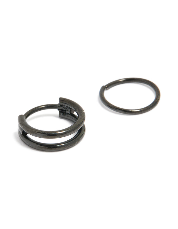 Showcasing black coated surgical steel double hinged and plain nose rings in chunky style detail view