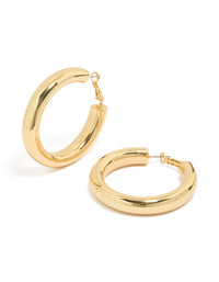 Showcasing gold plated thick chunky hoop earrings in gold front view - link has visual effect only