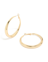 Showcasing medium hoop earrings with gold plated material and hoop closure in gold front view - link has visual effect only