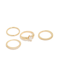 Elegant gold plated bezel set cubic zirconia band rings 4-pack featuring oval cut crystal stones front view - link has visual effect only