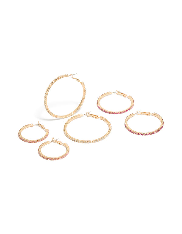 Showcasing gold clear and pink diamante mixed size hoop earrings in a 3-pack front view