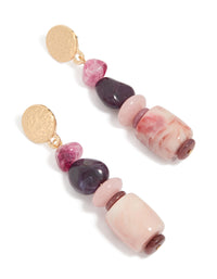 These chunky drop earrings feature irregular beads with charm accents and stud closure in pink and gold tones front view - link has visual effect only