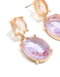Showcasing statement double drop earrings in gold with purple and orange diamantes close up view - link has visual effect only